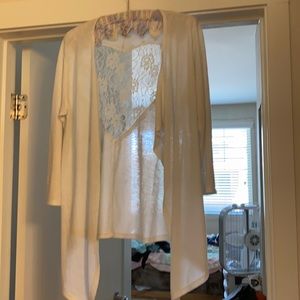 This sweater has a lace heart in the back